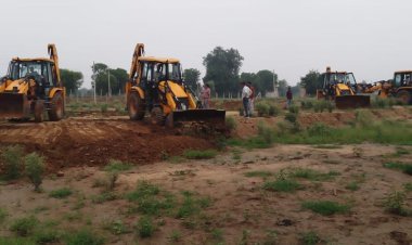 यूआईटी द्वारा अवैध प्लॉटिंग के विरूद्ध कार्रवाई कर कृषि भूमि पर से हटाया अतिक्रमण 