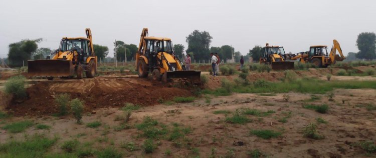 यूआईटी द्वारा अवैध प्लॉटिंग के विरूद्ध कार्रवाई कर कृषि भूमि पर से हटाया अतिक्रमण 